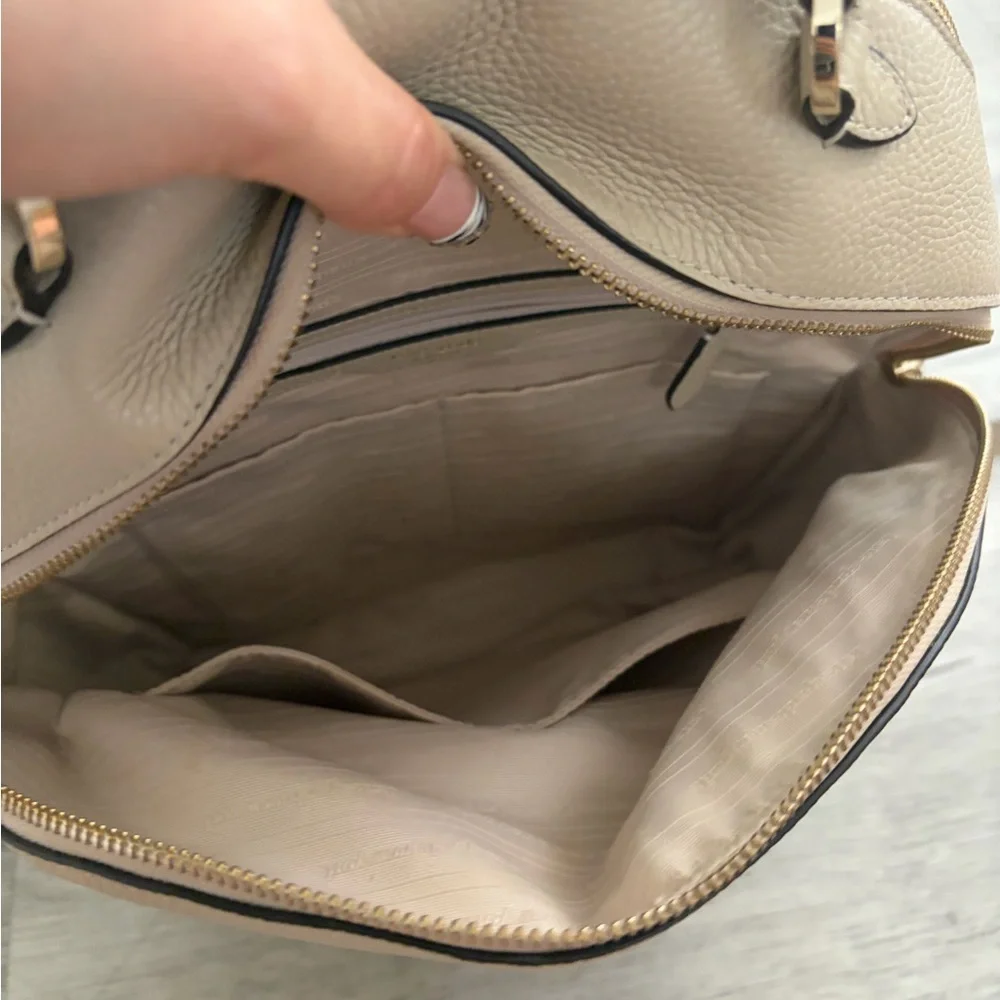 kate spade pebble leather backpack in cream with gold hardware